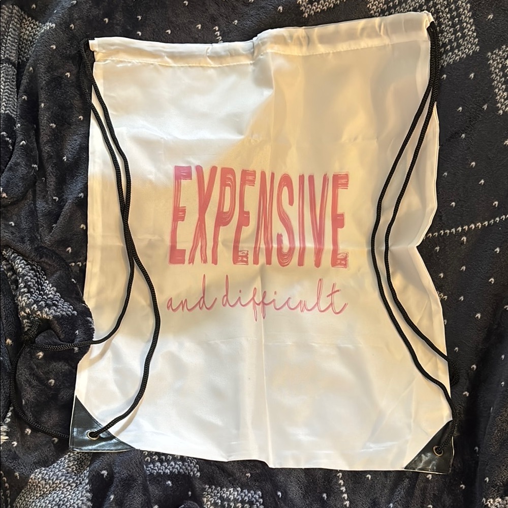 White Drawstring Bag with Pink Text